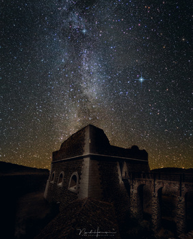 Reality or manipulation? I photographed this fortress during a summer holiday in broad daylight. I transformed it into a night scenery, and added a Milky Way photo I made somewhere else. As a matter of fact, the image is facing North, away from the cent