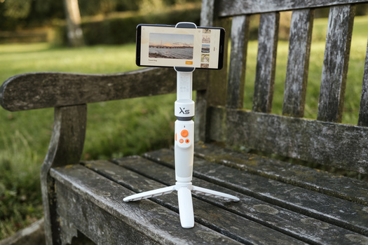 Zhiyun Smooth-XS gimbal review Zhiyun Smooth-XS gimbal on a bench in a park