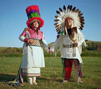 Leica Women Foto Award winner Matika Wilbur A Native American couple posing outdoors.