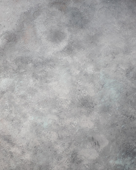 Close-up texture of weathered concrete surface with mottled gray and white tones.