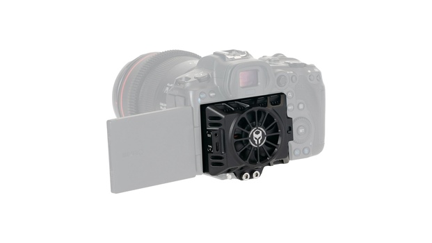 Illustration of a fan-based cooling module mounted on a camera body with lens attached.