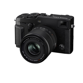 Black mirrorless camera with prime lens attached, shown at three-quarter angle against white background.
