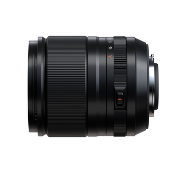 Black telephoto zoom lens with ribbed focus ring and control switches, viewed from the side.