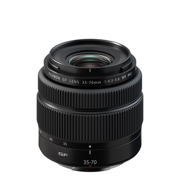 Fujifilm GF 35-70mm f/4.5-5.6 WR lens with vertically ribbed barrel and focus ring against white background.