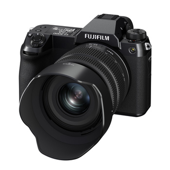 Fujifilm mirrorless camera with attached wide-angle lens, shown at an angle against white background.