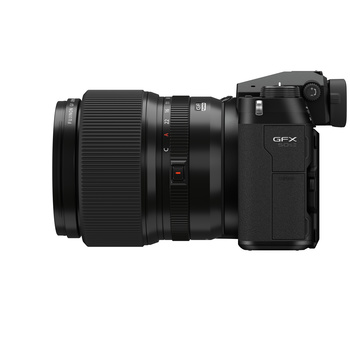 Mirrorless camera body with attached prime lens, shown from the right side against a white background.