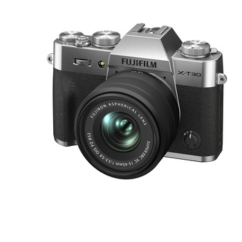 Fujifilm X-T30 mirrorless camera with silver and black body and attached XC 15-45mm lens.