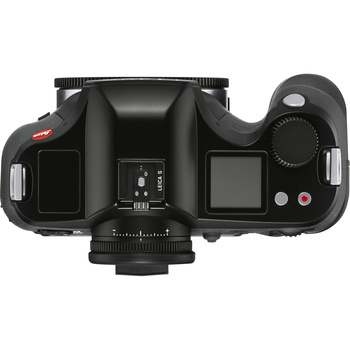 Top-down view of a mirrorless camera body with electronic viewfinder and control layout.