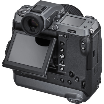 Professional cinema camera with articulating LCD screen and shoulder-mounted recording module.
