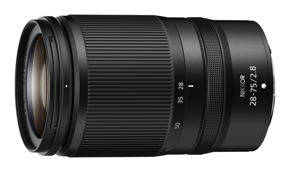 Nikon Z-mount telephoto zoom lens with barrel extending leftward, focal length markings visible on barrel.
