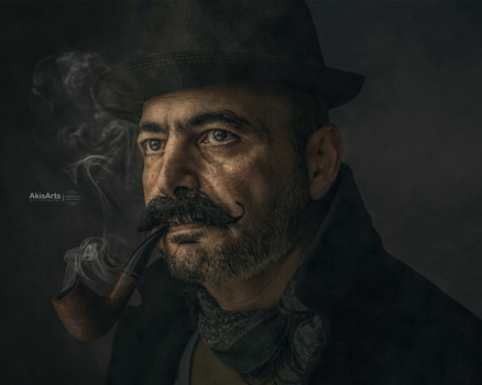 Bearded man in dark fedora smoking pipe, dramatic studio portrait with moody lighting.