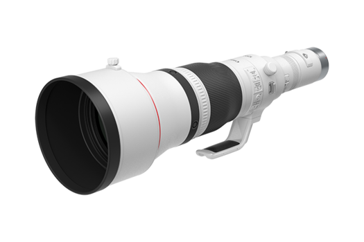 White telephoto lens with black barrel and front element, shown in profile against white background.