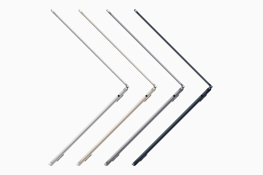 Four chevron-shaped metal brackets arranged in a gradient from light gray to dark blue.