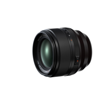Black camera lens with multicoated glass elements and focus ring, photographed against a white background.