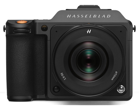 Hasselblad medium format camera with integrated grip and fixed lens against white background.