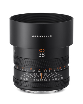 Hasselblad XCD 38mm lens with hood attached, showing aperture ring and distance scale markings.