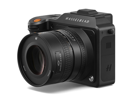 Hasselblad medium-format camera with attached lens on white background.