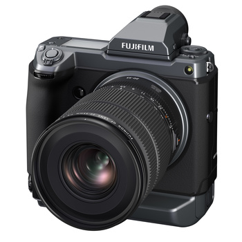 Fujifilm GFX mirrorless camera with attached zoom lens, shown against white background.