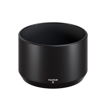 Black cylindrical camera lens hood with threaded interior and Fujifilm branding.