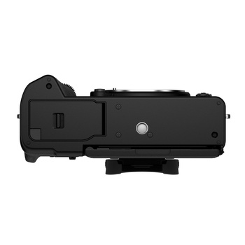 Top-down view of a black mirrorless camera body with open battery door and tripod mount.
