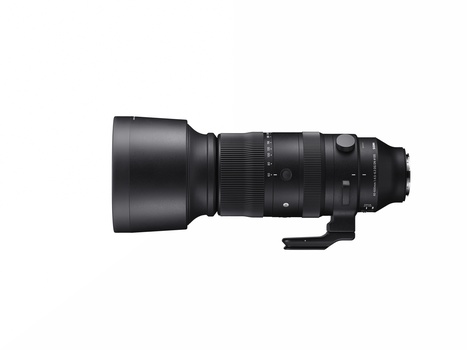 Black telephoto lens with extended barrel and tripod collar mounted on white background.
