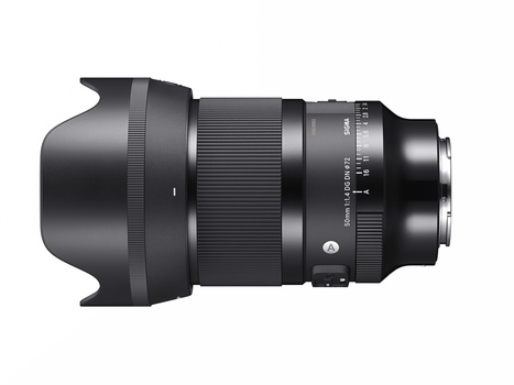 Black telephoto lens with hood and focus ring against white background.