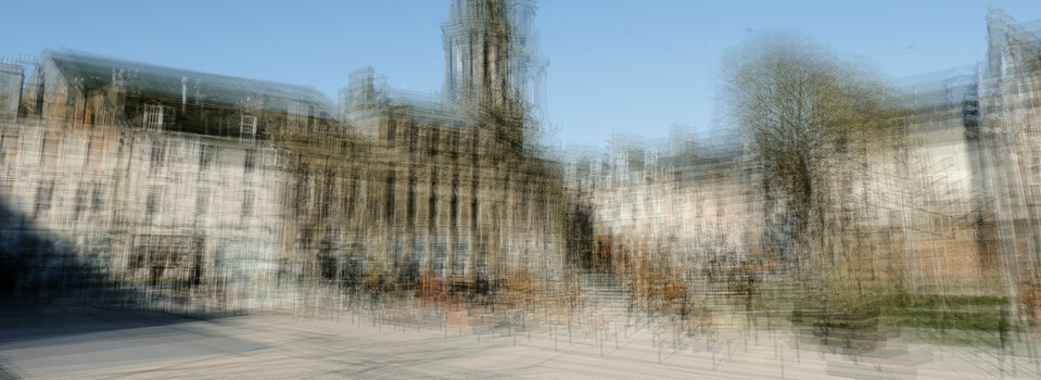 Blurred overlay of Gothic cathedral architecture with multiple exposures creating ethereal, translucent effect.