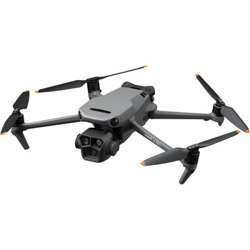 Gray quadcopter drone with four propellers and dual cameras mounted on stabilized gimbal.