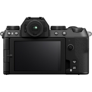 Mirrorless camera shown from rear angle with articulating touchscreen display and control buttons visible.