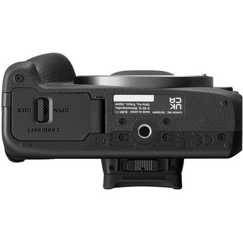 Top-down view of a mirrorless camera body showing the grip, control buttons, and connectivity ports.