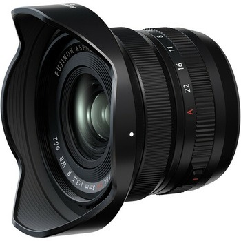 Wide-angle prime lens with hood attached, showing focus and aperture rings against white background.