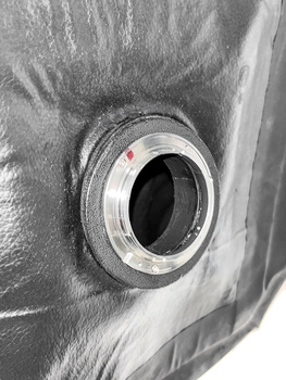Close-up of a camera lens mount showing the internal bayonet mechanism and glass elements.