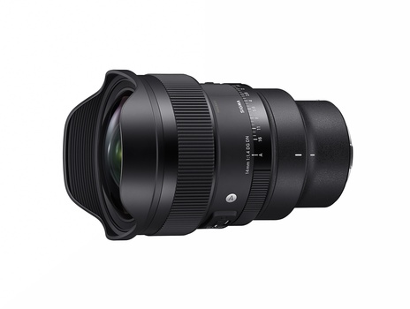 Black telephoto lens with focus ring and aperture controls against white background.