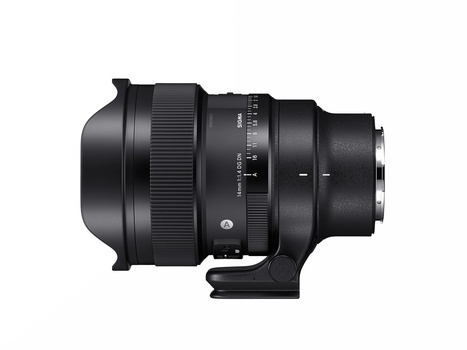 Black telephoto lens with focus ring and distance scale markings, mounted on tripod collar.