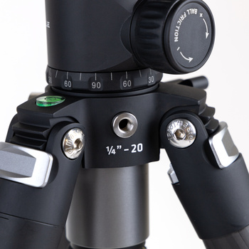 Close-up of a professional tripod head with 1/4"-20 mount, pan-tilt controls, and degree markings.
