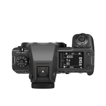 Top-down view of a professional mirrorless camera with articulating screen and electronic viewfinder.