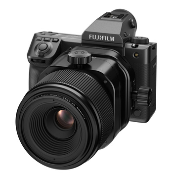 Fujifilm GFX medium format mirrorless camera with attached prime lens on white background.