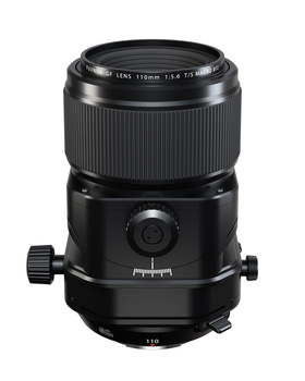 Black tilt-shift lens with focus ring and depth-of-field scale mounted vertically against white background.