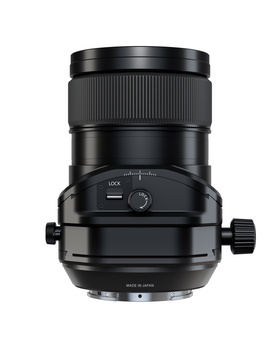 Black tilt-shift lens with focus ring and depth-of-field control mounted vertically against white background.