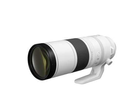 White telephoto lens with black focus ring and front element against neutral background.