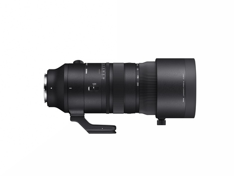 Black telephoto lens with focus ring and tripod collar mounted on white background.