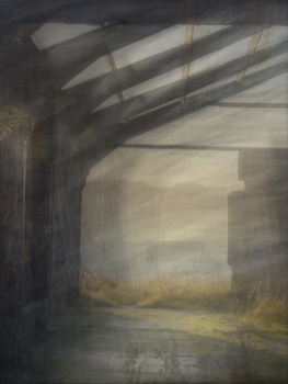 Industrial bridge or overpass structure with dramatic light rays streaming through support beams onto a misty landscape below.