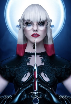 Portrait of a figure with platinum blonde hair, dramatic makeup, and a high-tech aesthetic wearing black garments against a glowing blue halo.