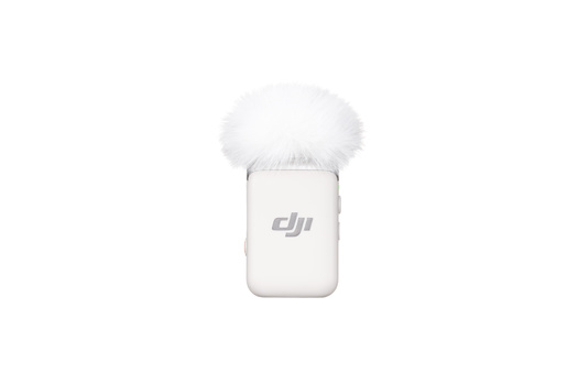 DJI wireless microphone with white fuzzy windscreen attached to compact white transmitter unit.