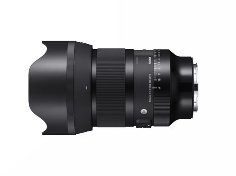 Wide-angle zoom lens with detachable hood, shown in profile against white background.