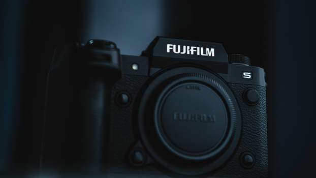 Fujifilm GFX S medium format camera body displayed against a dark blue background.