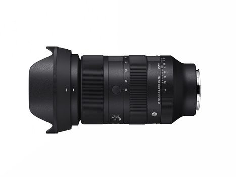 Telephoto zoom lens with lens hood attached, shown against a white background.