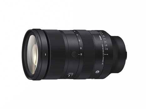 Black telephoto zoom lens with ribbed focus ring and depth-of-field scale markings.