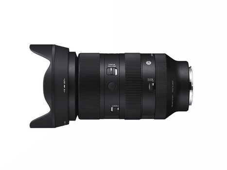 Black telephoto zoom lens with hood attached, shown in profile against white background.