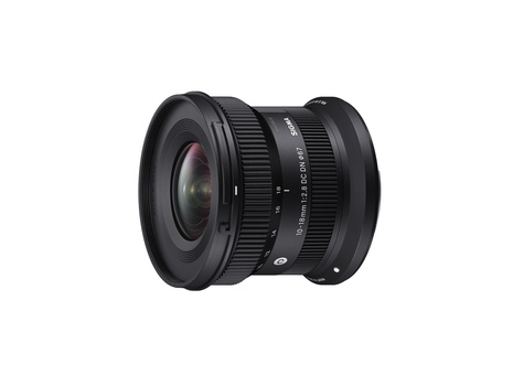 Wide-angle zoom lens with black barrel and glass elements visible through the front element.